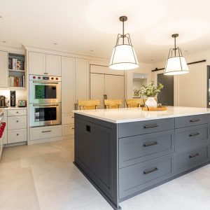 WIHM Design kitchen with island and white cabinets