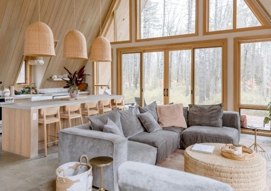 WIHM Design a frame home interior design with grey couch and wood features